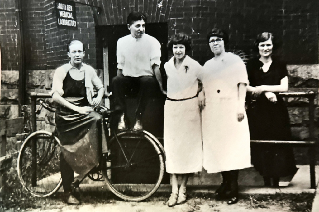 Dr. Giordano (second from left) and laboratory staff outside the entrance to the original location in Epworth Hospital, circa 1912